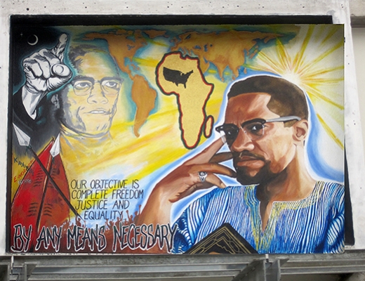 Mural of Malcolm X inside Cesar Chavez Student Center